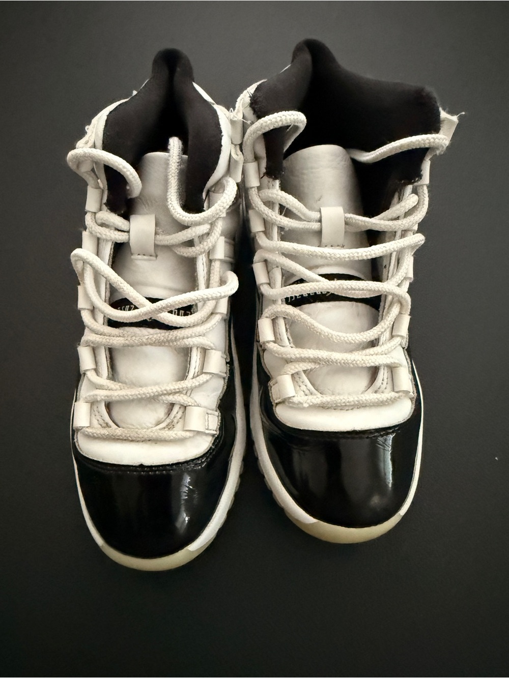 Nike Jordan 11 Kids Black and White High-Top Sneakers